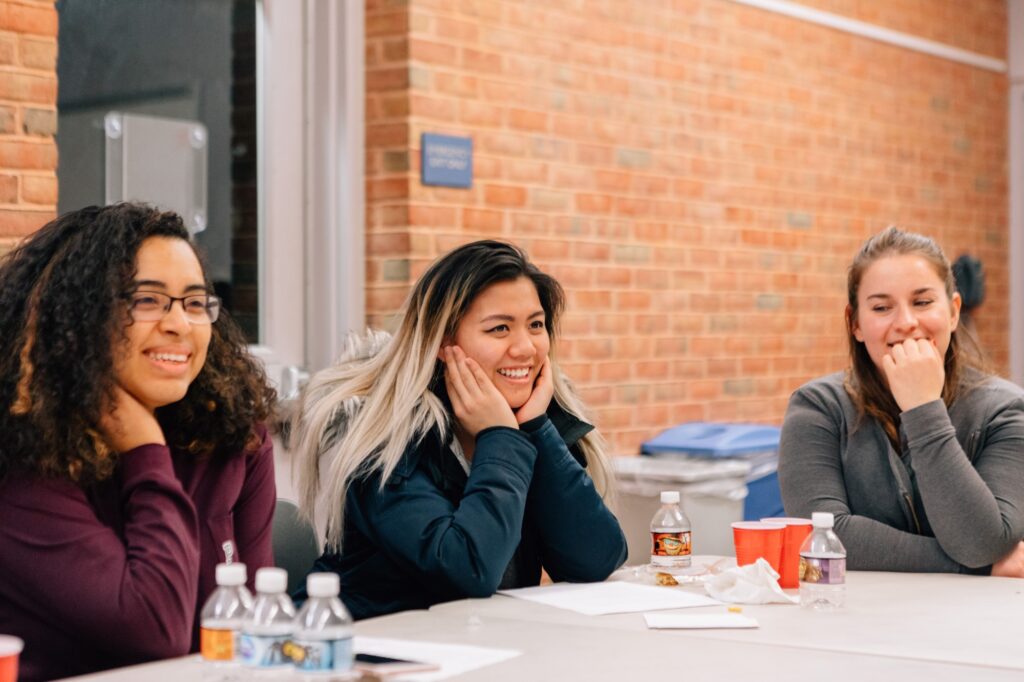 (Left to Right) Generation Hope Scholar Karen, Generation Hope Scholar Christina, and Generation Hope coach Sophie - 